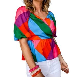 Skies Are Blue Anthropologie colorblock surplice v-neck puff sleeve peplum top